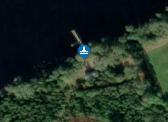 Satellite image of Tjugestasjön